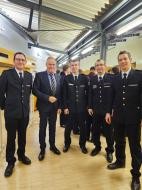 Gruppenbild Gruppenbild mit OB Würzner, dem Stadtbrandmeister-Team und dem Leiter der Feuerwehr Heidelberg, Heiko Holler